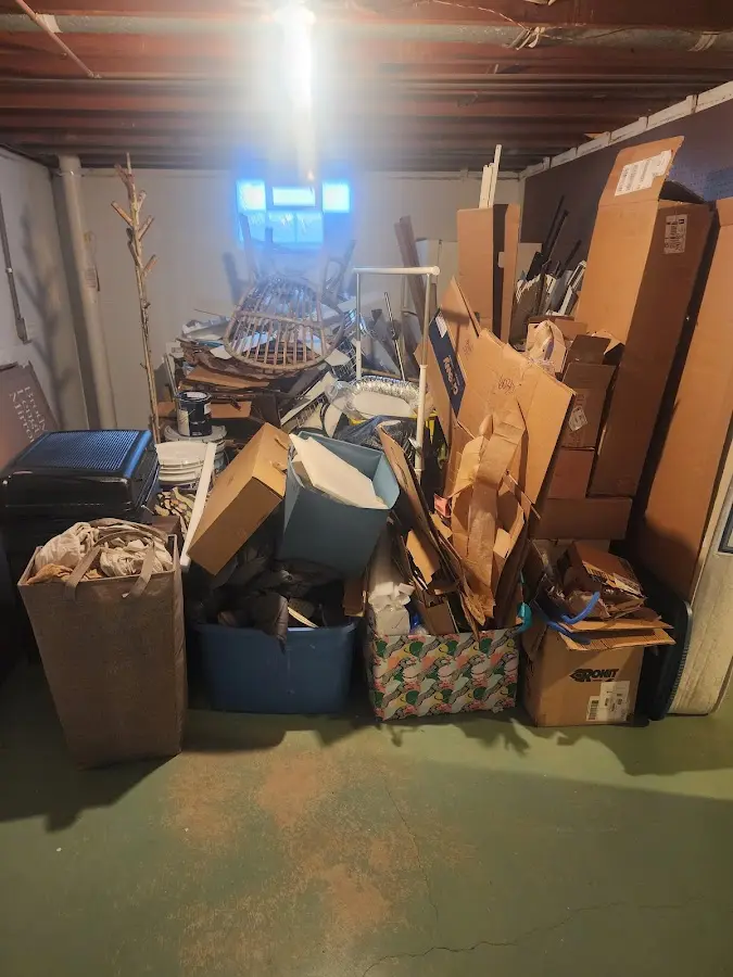 Roll-off dumpster container at job site for 2 Yard Dumpster Rental in Floresville